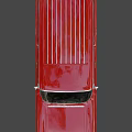 Classic Red and White Station Wagon with Chrome Accents and Vintage Wheels