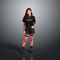 Woman in Black CHAOS T Shirt Black Shorts Fishnet Stockings Black Boots on Grey Background