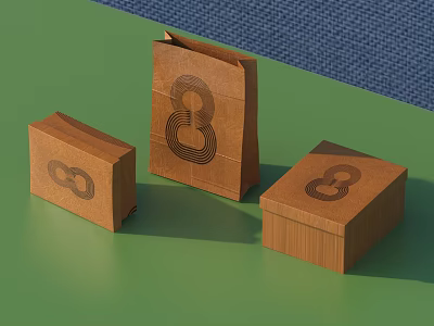 Decorative Ornament Set With Three Brown Boxes And Infinity Symbol On Green Tabletop 3d model