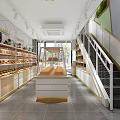 Modern Dessert Shop Interior Design With Open Layout Fresh Bread Display Shelves And Staircase