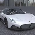 White Sports Car With Modern Sleek Body Design Black Wheels And Glass Building Outdoor Setting