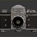 Vintage Electronic Camera With Silver Metal Body Lens And Buttons On Dark Background With Reflection