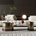 Elegant Modern Coffee Table With Glass Top Metal Base Small Plant And White Sofa