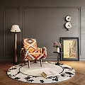 Colorful Patterned Accent Chair on Round Rug with Floor Lamp Side Table and Wall Art