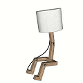 Wooden Table Lamp On Stacked Books With Green Plant Bookshelf And Curtain