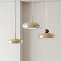 Modern Pendant Lights With Glass Shades Gold Hanging Rods And Red Accent Ball Interior Decor
