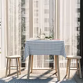 Cozy Home Table And Chairs Set With Checkered Tablecloth Laptop And Green Plant