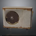 Vintage Rusted Metal Equipment With Circular Fan Grille And Aged Surface