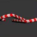 Crossed Red And White Striped Candy Canes Against Dark Background With Shiny Reflection