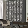Elegant Black Wardrobe with Intricate Carved Floral Design Panels in Bedroom Setting