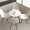 Modern Round White Table And Chairs Set With Wooden Legs Near Window