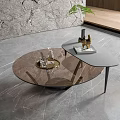 Modern Round Glass Coffee Table With Black Frame Tray Green Plant On Gray Marble Floor