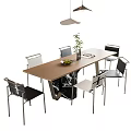 Modern Dining Table And Chairs Set With Wooden Top Metal Frames Plant Fruit Bowl And Magazine