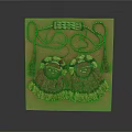 Pair Of Decorative Tassel Ornaments With Embroidered Design On Pink Display Board