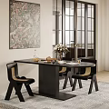 Black Oval Dining Table Set With Woven Chairs Flower Vase Food Items And Wall Art
