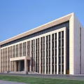 Modern Office Building With Stone Facade Large Glass Windows Main Entrance And Landscaped Lawn