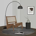 Modern Rattan Back Wooden Lounge Chair With Floor Lamp Wall Art And Side Table