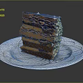 Delicious Layered Chocolate Cake With Creamy Layers And Nut Toppings On White Patterned Plate