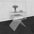 Modern Glass Side Table With X Shaped Base And Books Lamp Decorative Object 3d model