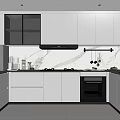 Modern Kitchen Interior With White Cabinets Black Appliances And Marble Countertops