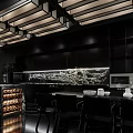 Modern Black Kitchen Interior With Marble Accents Wine Rack And Pendant Lights