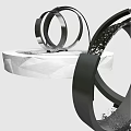 Modern Garden Ornament with Metal Rings and Water Feature on White Polygonal Base