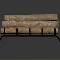 Tree Logs Stacked on Black Metal Rack for Home Decoration