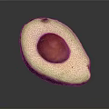 Fresh Half Avocado With Green Flesh And Brown Seed On Gray Background