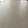Light Colored Wooden Floor Components With Herringbone Parquet Patterns And Natural Texture