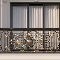 Ornate Balcony Railing with Intricate Iron Design and Gold Decorative Accents