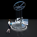Industrial Equipment Display Platform With Wind Turbine Models And Female Observer