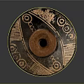 Ancient Clay Pottery Sculpture With Intricate Carved Patterns And Textured Surface