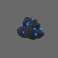 Black Sculpture Carving With Blue Decorative Elements And Textured Surface