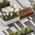 Modern Landscape Seat Surrounded by Greenery and Gray White Striped Paving