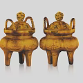 Two Elegant Traditional Golden Tripod Censers with Lion Head Lids and Intricate Decorative Patterns