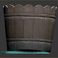 Decorative Ornaments Set Displayed in Wooden Bucket With Scalloped Edge on Green Mat