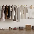 Fashionable Clothes Hanging On Hangers With Hats Bags And Shoes On Light Wall Wooden Floor