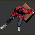 Man Wearing Red Love Me Sweater Sitting on Brown Trunk Blue Jeans White Sneakers