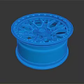 Blue 3D Rendered Wheel Rim With Stylish Spokes And Reflective Surface On Dark Backdrop