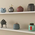 Stylish Ceramic Vessels Displayed on White Shelves with Various Colors and Decorative Details