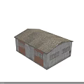 Old Warehouse Style Building With Gray Red Walls Sloped Roof And Windows