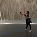 Stunning Hanging Art Installation With Long Strips Blue Lights And Person Underneath