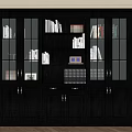Black Wooden Bookcase With Glass Doors And Shelves Filled With Books And Frames