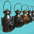 Vintage Multiple Candle Lanterns in Black and Brown With Handles on Light Blue Background