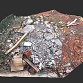 Landscape Project Site With Construction Debris Gravel Bricks And Wooden Boards