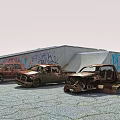 Rusted Utility Vehicles Parked Near Graffiti Covered Warehouse On Cracked Concrete