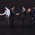 Group Of Business Professionals Shaking Hands Talking And Pointing In Formal Attire