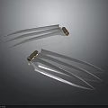Sharp Metal Claw Weapons With Silver Blades Golden Handles And Reflective Surface