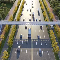 Scenic Landscape Bridge Over Busy Road With Vehicles And Green Trees
