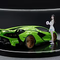 Green Lamborghini Sports Car with Female Model Holding Pink Ball on Black Circular Display Platform